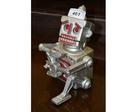 A cast metal Robert the Robot money bank