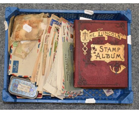 Blue Plastic Tray with an old accumulation in packets, tins, covers and a Lincoln stamp album. Note early Commonwealth, GB an