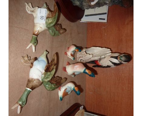 Goebel woodpecker, 2 continental flying ducks and a set of 3 ducks