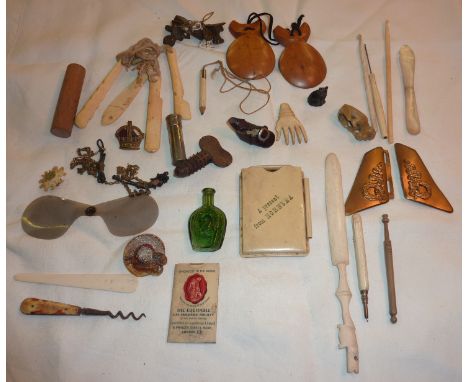Bone letter opener, mother of pearl letter opener, miniature leather shoe, soapstone monkey etc