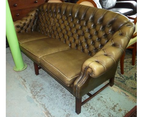 Leather Chesterfield 3 seat sofa on mahogany supports