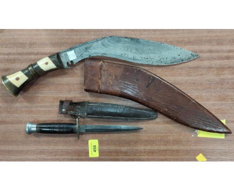 A horn and bone handled kukhri in leather scabbard, lenth43cm and a British knife by William Rodgers of Sheffield, length 25c