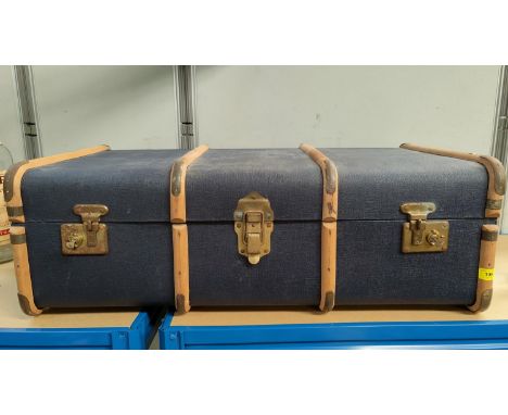 A wood bound cabin trunk 