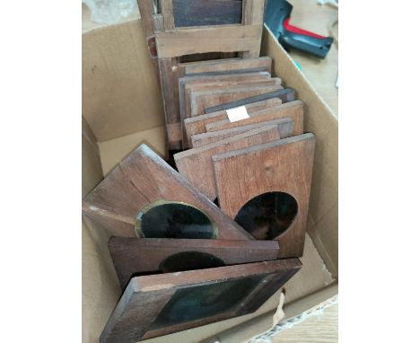 14 Magic Lantern slides in wooden frames and other frames. 