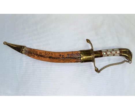 A vintage Sikh dagger with mother of pearl inlaid hilt, curved blade with relief decoration &amp; brass mounted leather scabb