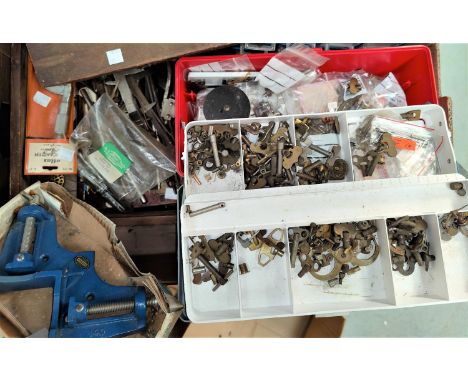 A selection of watchmaker's tools, parts etc 