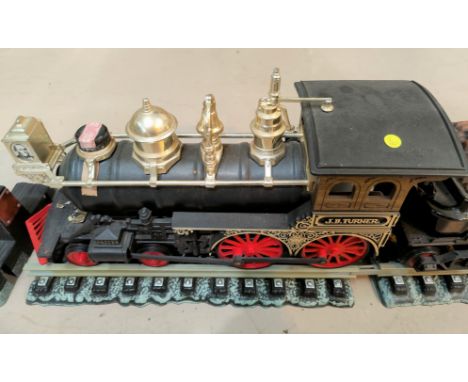 A 'Jim Beam' 150 month old Kentucky whiskey train, featuring engine and four other carriages containing whiskey; seals presen