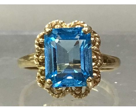 GOLD AND TOPAZ DRESS RING marked nine carat gold to insideQty: 1The ring is size N