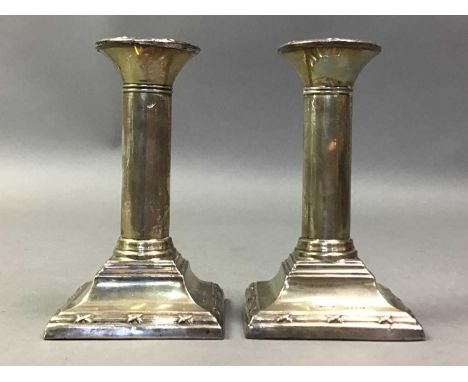 PAIR OF GEORGE V SILVER CANDLESTICKS DATED 1923 each candlestick hallmarked for Birmingham 1923, along with a pair of smaller