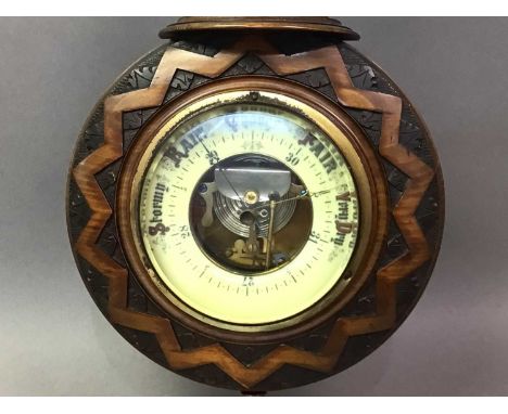 LATE VICTORIAN ANEROID BAROMETER in walnut case57cm high
