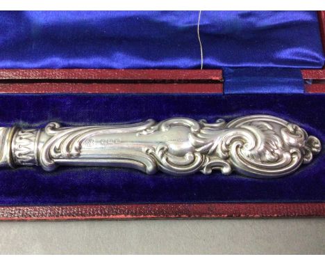 EDWARDIAN SILVER CAKE KNIFE AND OTHER SILVER ITEMS the cake knife hallmarked for Sheffield 1904, along with a silver bon bon 