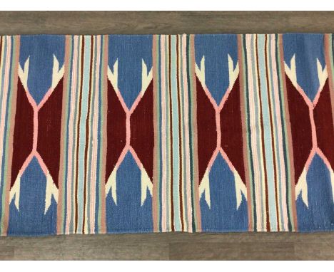 WOOLEN HALL RUNNER CIRCA 1990-99 with repeated motif in red and stripes240cm x 70cm