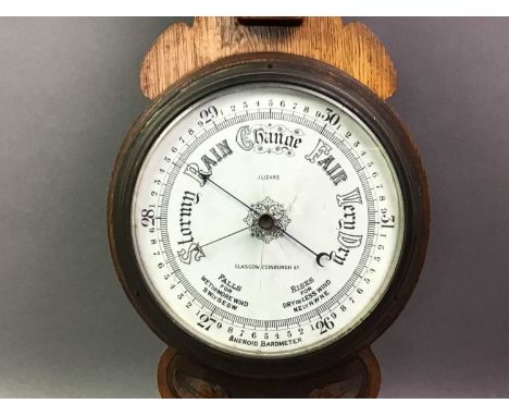 LATE VICTORIAN BAROMETER WITH THERMOMETER in oak case Thermometer working. Barometer has cracked glass and doesn't appear to 