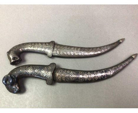 PAIR OF INDIAN KARD DAGGERS in white metal with niello enamel