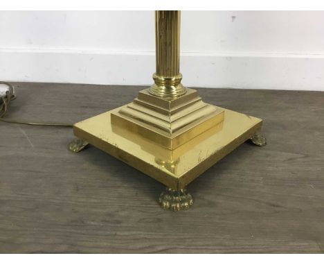 BRASS STANDARD LAMP AND A SIMILAR TABLE LAMP the table lamp with green shadeQty: 2