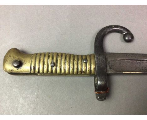 FRENCH CHASSEPOT BAYONET LATE 19TH CENTURY signed and dated 1872 to blade back, lacking scabbard, together with a 1958 shellt