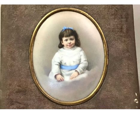 PORTRAIT MINIATURE OF A GIRL in oval frame8cm x 6cm 