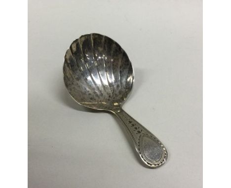 A good Georgian silver caddy spoon with bright cut decoration. London. By George Wintle. Approx. 7 grams. Est. £40 - £60.