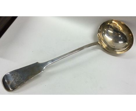 EXETER: A large fiddle pattern silver soup ladle with gilt bowl. By WRS. Approx. 194 grams. Est. £80 - £120.