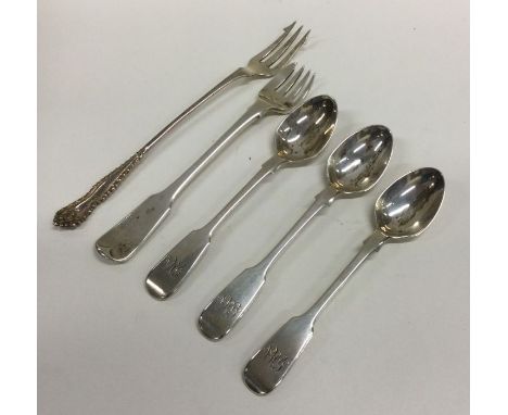 EXETER: A group of three silver egg spoons together with a pickle fork etc. Approx. 89 grams. Est. £30 - £50.