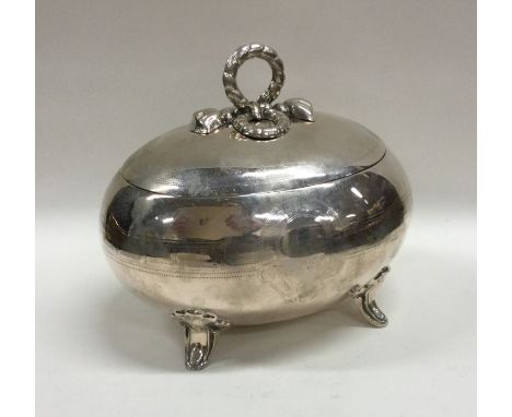 An Austrian silver tea caddy with rope twist handle to scroll feet. Approx. 257 grams. Est. £300 - £400.