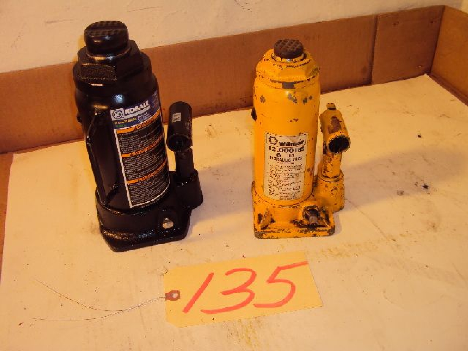 (2) Hydraulic Bottle Jacks (1)Kobalt 12 Ton & (1) Wilmar 6 Ton as a lot