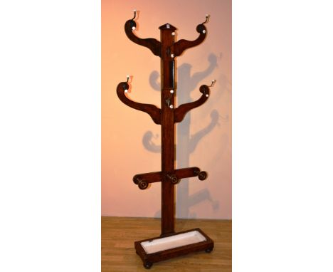 A Victorian oak 'Tree' hallstand, with later ceramic and gilt metal pegs, 168cm high x 83cm wide