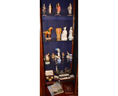 A quantity of Oriental painted wood figures, Eastern metalwares and porcelain, to include Hummel figures, plated shell salts 