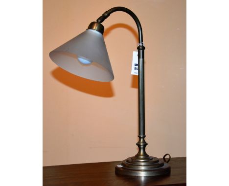 An adjustable desk lamp, with glass shade, 49cm high