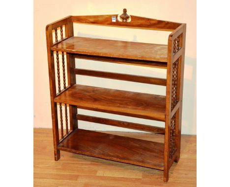 An oak effect folding open bookcase, 90cm high x 71cm wide x 40cm deep CONDITION REPORT: Lot 557 - Light stained oak, circa m
