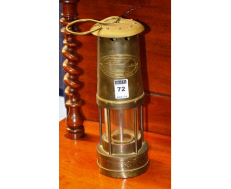 A vintage miners safety lamp, by E Thomas & Williams, Aberdare, 25cm high