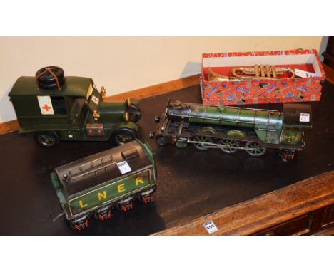 A Tri-ang toy trumpet, 33cm long, in original box, together with a Flying Scotsman model train with carriage and model army a