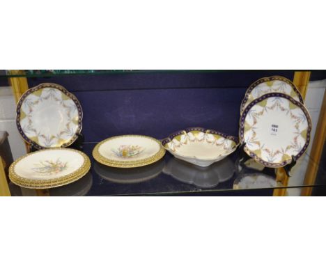 An early 20th century part porcelain fruit service, with fern decoration on white ground with gilded and faux mother of pearl