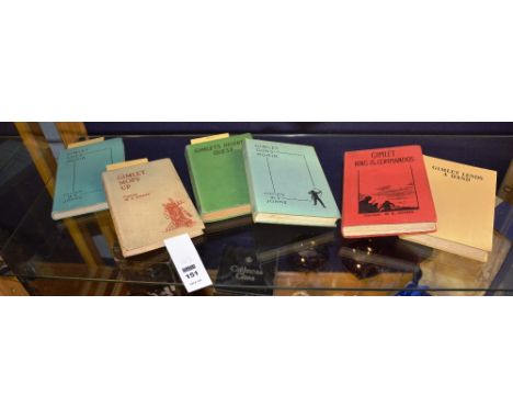 Three first edition books by Captain WE Johns, comprising of Gimlet Mops Up', 'Gimlets Oriental Quest' and 'Gimlet Goes Again