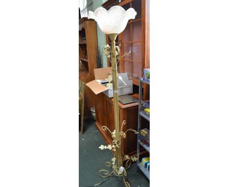 A floral decorated metal standard lamp