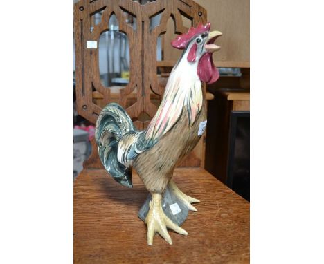 A ceramic painted cockerel