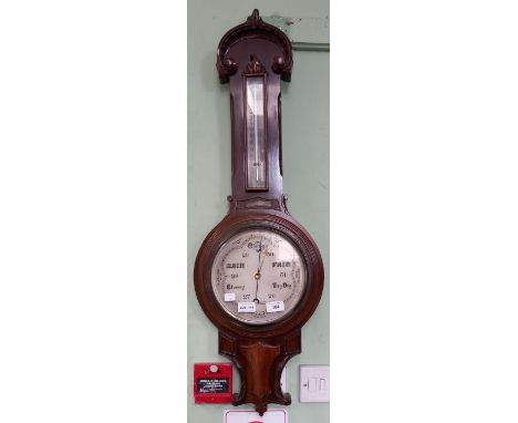 A Victorian wall hanging thermometer barometer