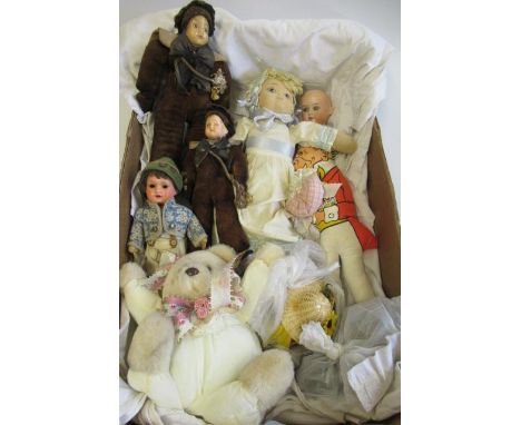 A collection of dolls and soft toys, including two composition head sailor boys with musical mechanisms, a hessian doll, a 39