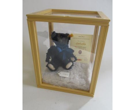 A Steiff Othello bear, serial number 0309, with certificate, ear button and tag, within perspex caseGood overall condition