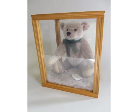 A Steiff Perfekt bear, no. 00420, with certificate, ear button and tag, within perspex caseGood overall condition