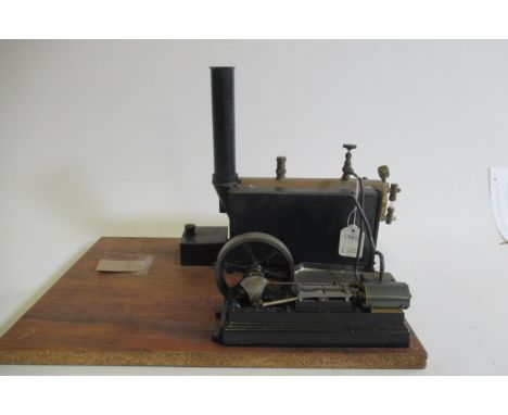 A Stuart single cylinder mill engine and boiler, non-reversing engine, boiler with pressure gauge, water gauge and regulator,