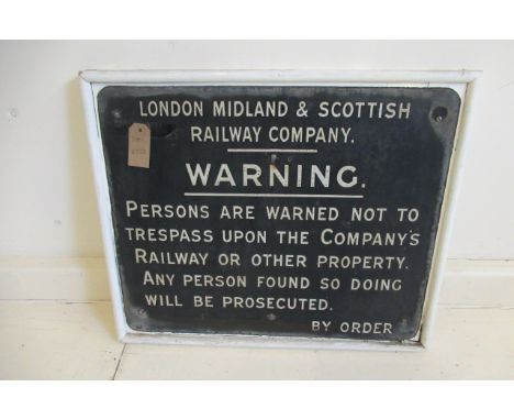 A London Midland and Scottish Railway enamel Trespass warning notice white letters on black background, 55cm x 47cm, F