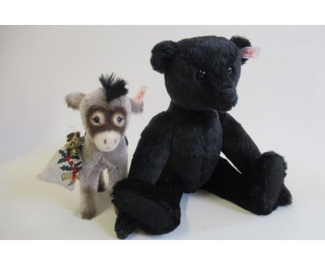 Two boxed Steiff items, comprising a 35cm black bear and a DonkeyGood overall condition, there should be another bear with th