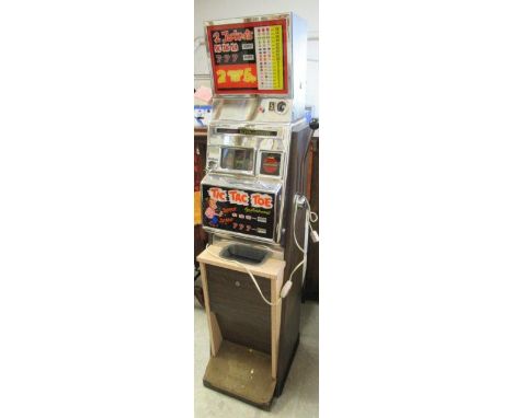 An Aristocrat Kingsway one armed bandit, Tic Tac Toe, with chip board back, chromed metal front, with wiring for light and ar