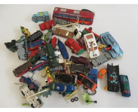 Unboxed playworn vehicles by Corgi, Dinky and others including Batmobile, Spectrum pursuit vehicle and Circus Land Rover, man