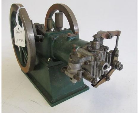 A single cylinder gas engine rotary valve, twin fly wheels, ignition plug absent, 30cm x 20cm x 15cm, F-G