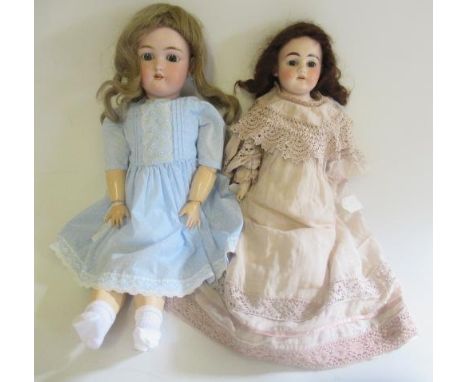 Two bisque head dolls, comprising an Ernst Heubach shoulder head doll, with blue glass fixed eyes, open mouth, top teeth, com