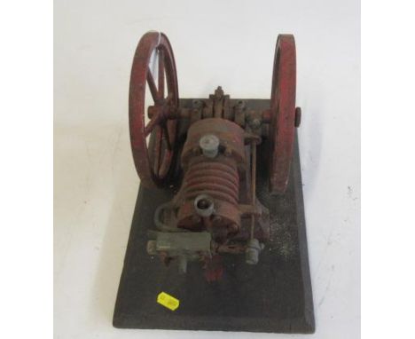 A single cylinder gas engine, much rusting to metal part, requires some restoration, 30cm x 20cm x 30cm, P