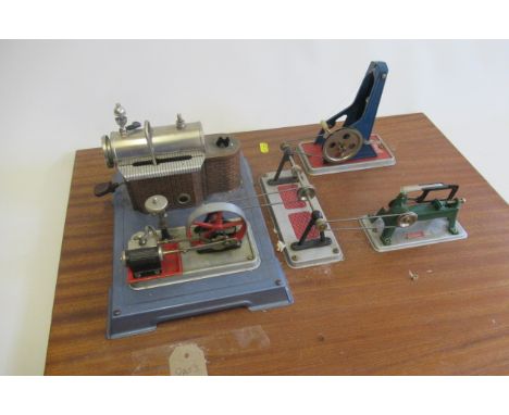 A Wilesco steam engine with two workshop tools and pulleys, steam engine chimney missing, F