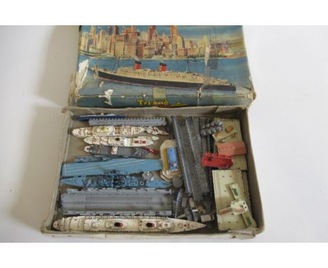 Triang Minic playworn ships and harbour pieces including R.M.S. Queen Elizabeth Royal Yacht, light vessel and dock buildings,